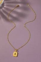 Brass diamond dust cut out initial necklace LA3accessories