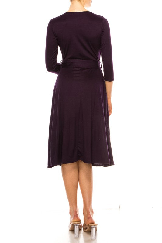 Solid faux wrap dress with deep V-neck Moa Collection