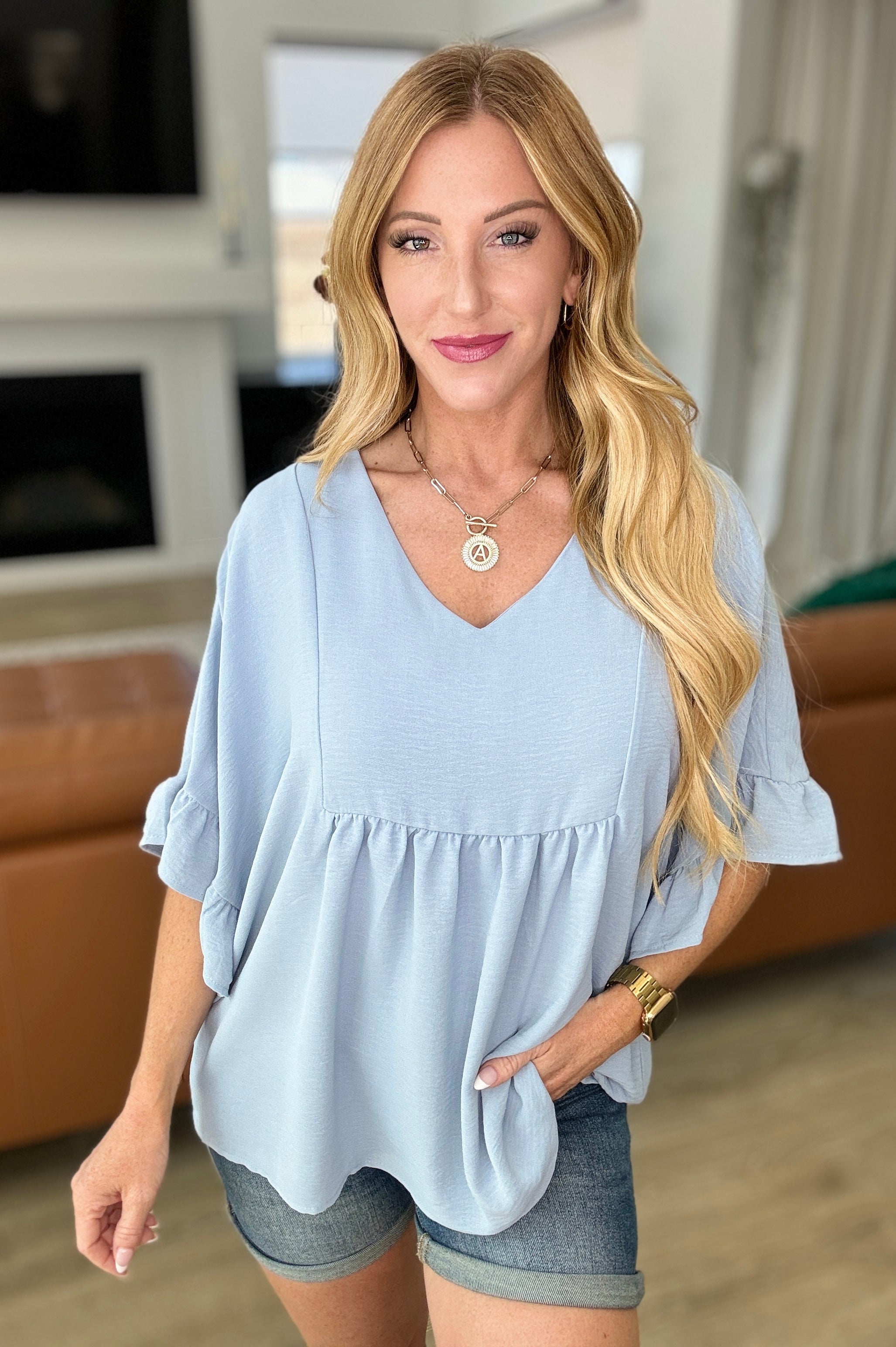 Airflow Peplum Ruffle Sleeve Top in Chambray Ave Shops