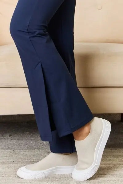 Kimberly C Full Size Wide Waistband Slit Flare Pants Trendsi