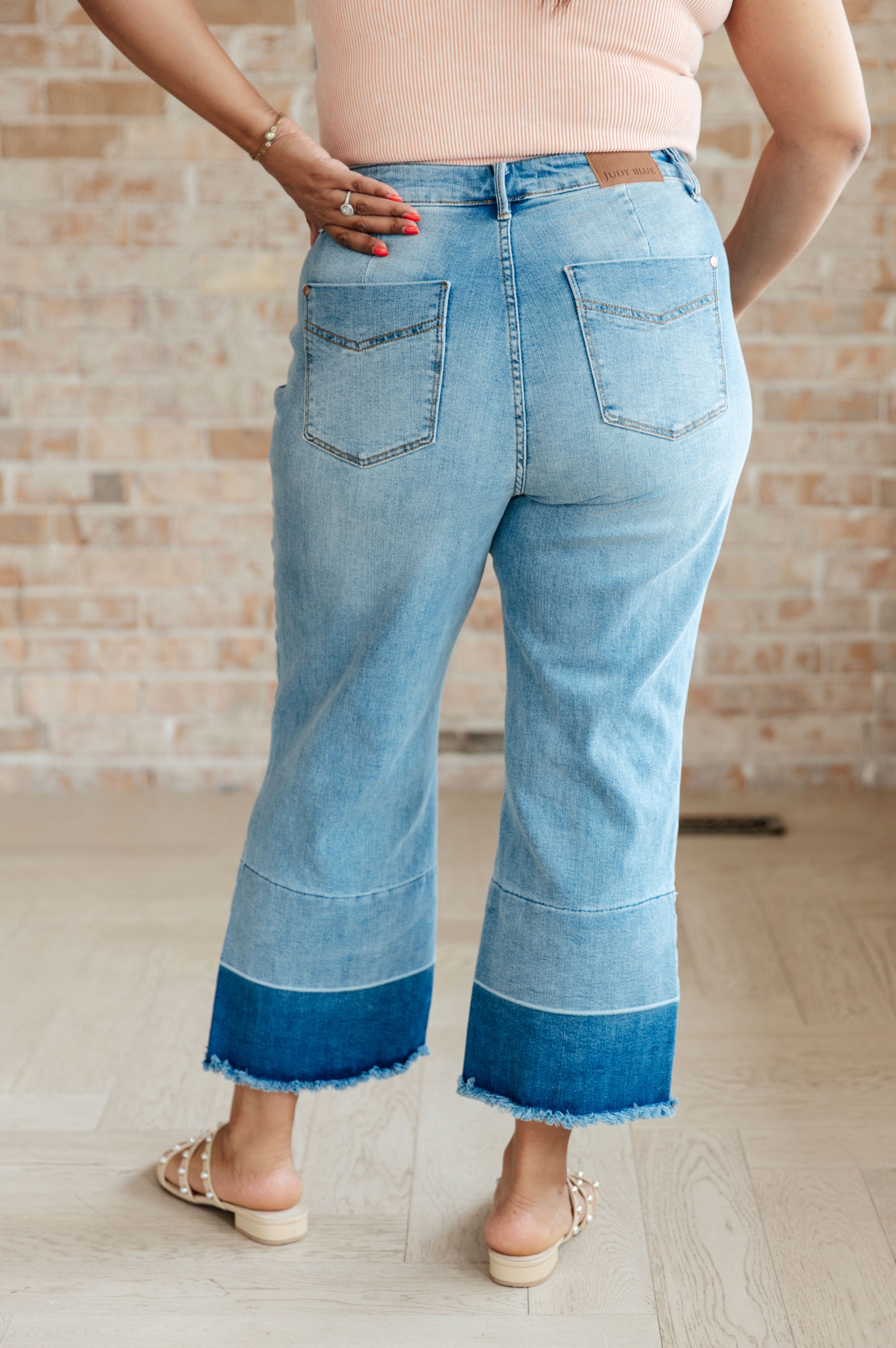 Olivia High Rise Wide Leg Crop Jeans in Medium Wash Ave Shops
