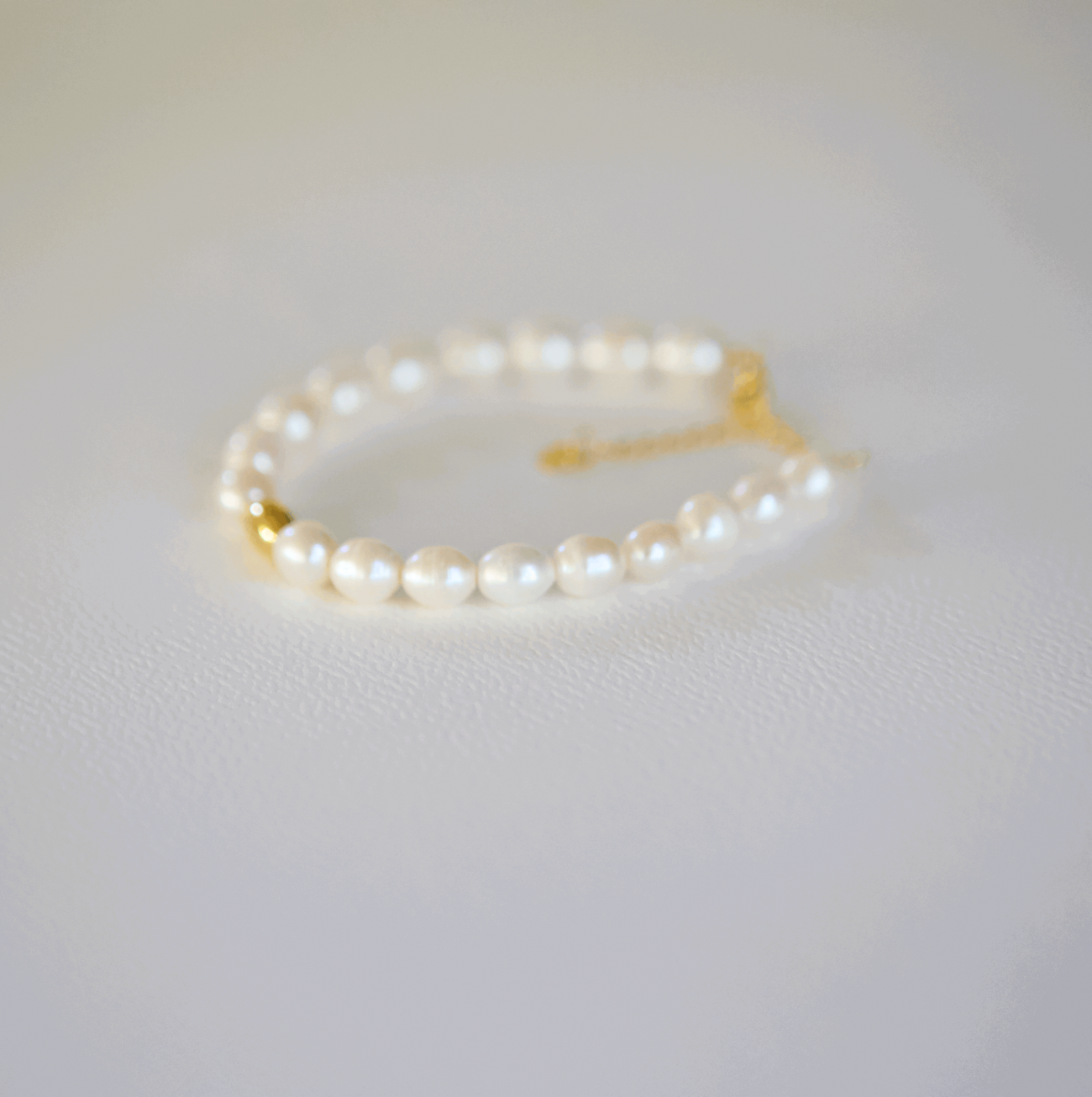 7mm freshwater pearl and 18k Gold Bead Adjustable Bracelet Creations by Kristel