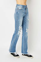 Judy Blue Full Size Distressed Raw Hem Bootcut Jeans Trendsi