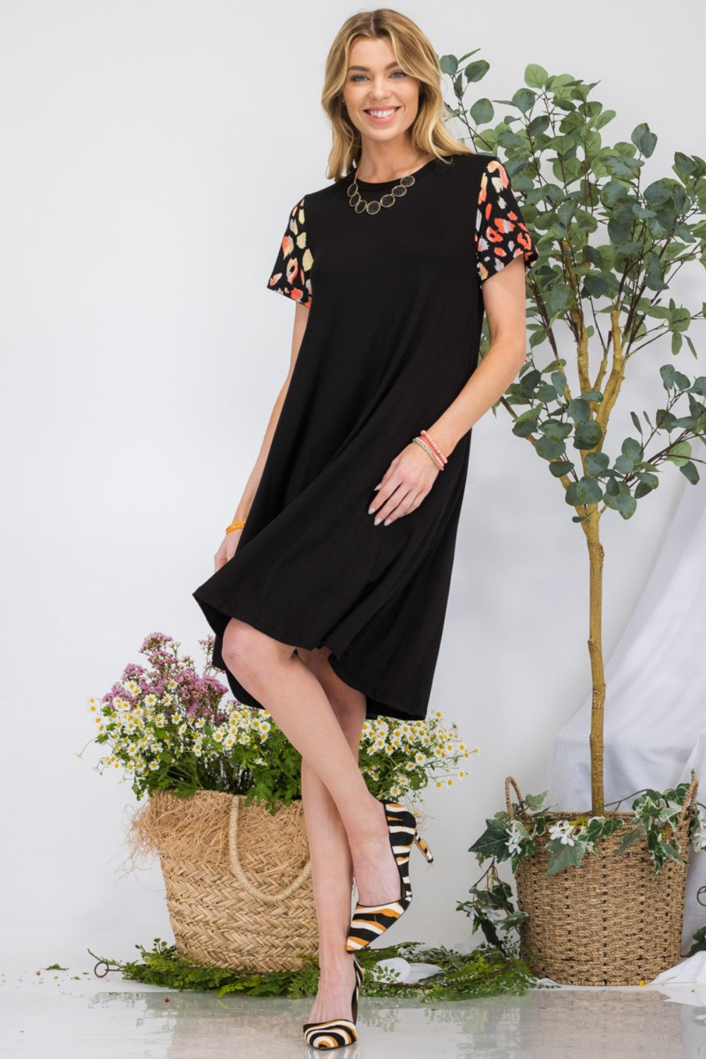 Celeste Full Size Leopard Short Sleeve Dress with Pockets Trendsi