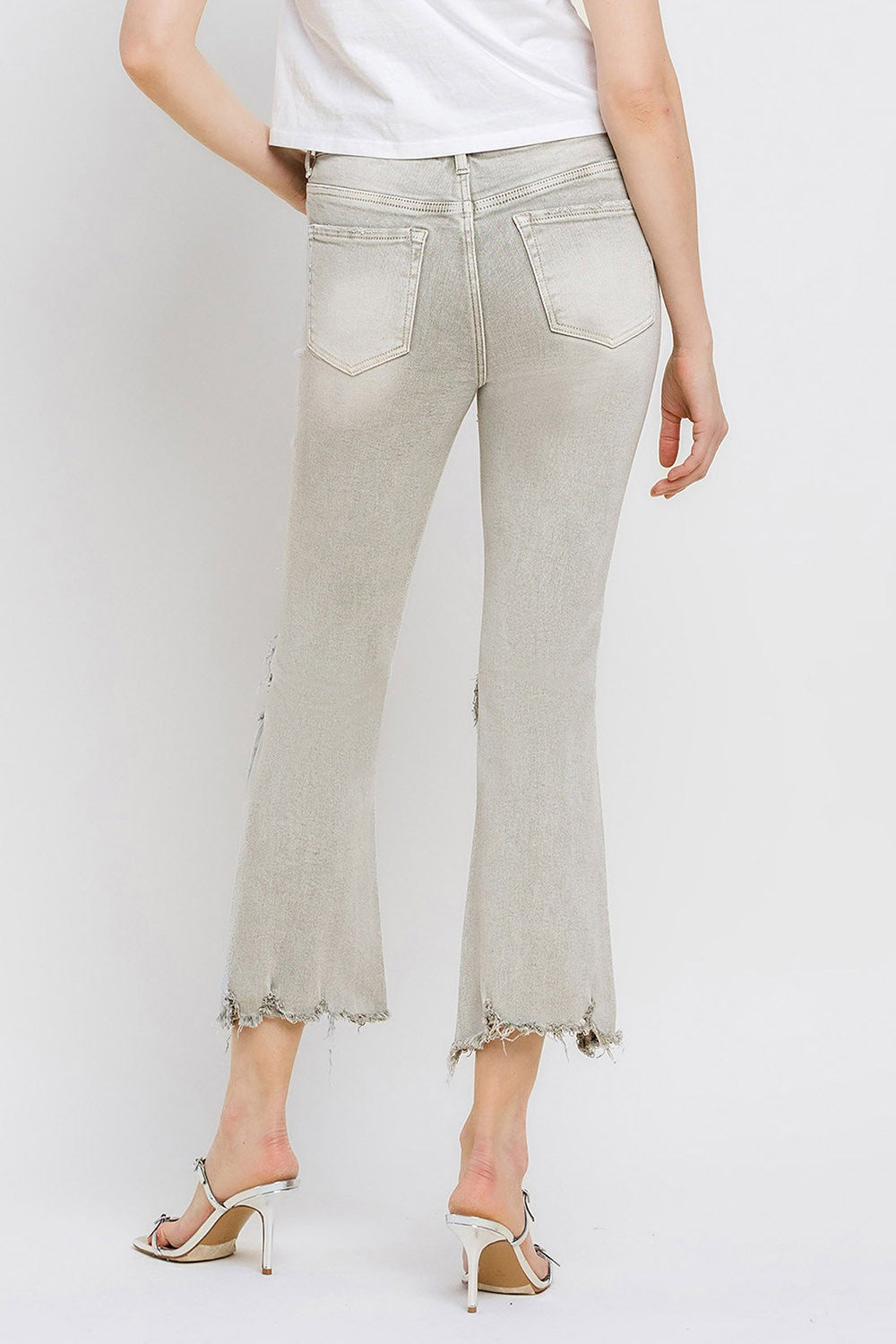Lovervet Distressed Raw Hem Cropped Flare Jeans Trendsi
