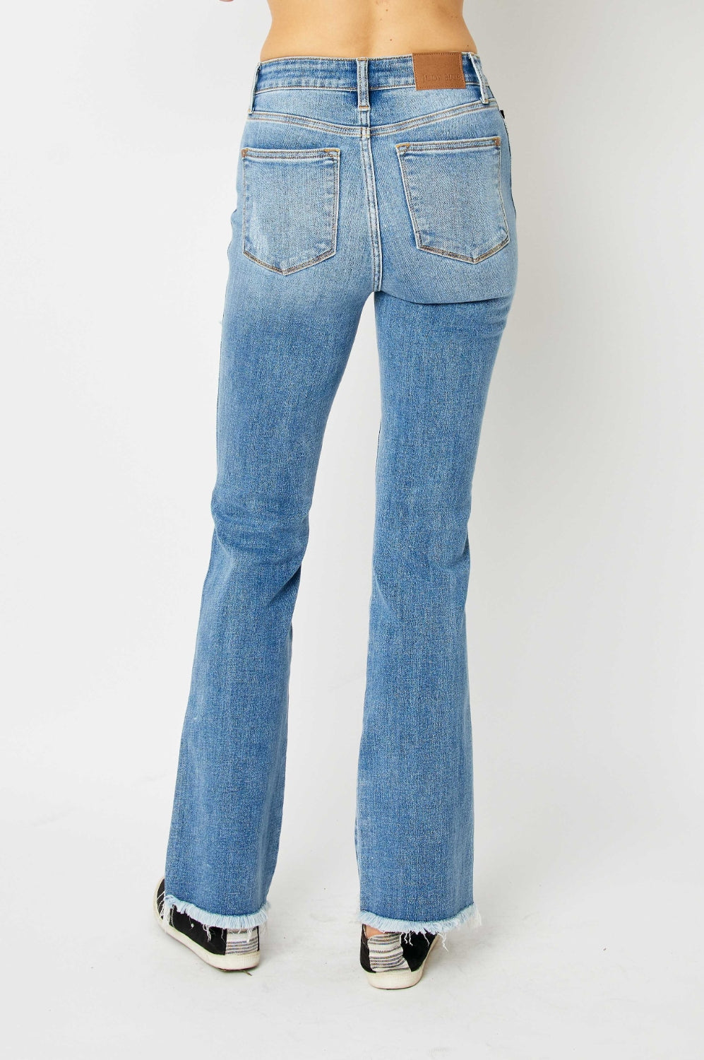 Judy Blue Full Size Distressed Raw Hem Bootcut Jeans Trendsi