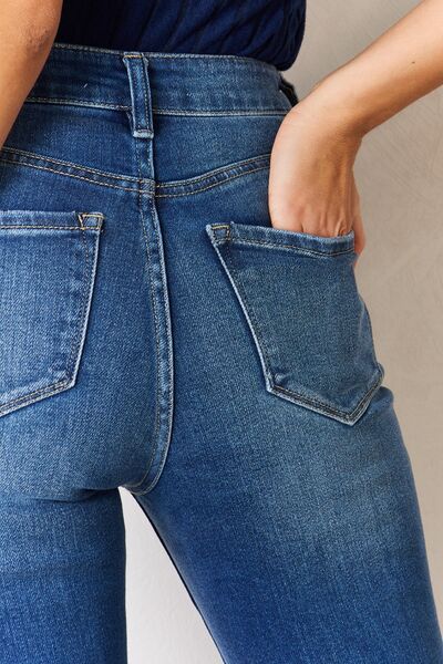 Kancan High Rise Raw Hem Flare Jeans Trendsi