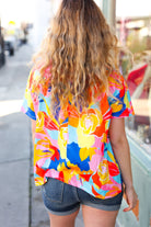 Orange & Yellow Geometric Floral V Neck Dolman Top Haptics