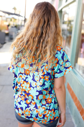 Blue & Orange Flat Floral V Neck Top Haptics