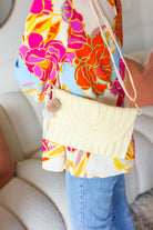 Raffia Flap Closure Clutch Bag with Wrist Strap and Pom Pom ICON