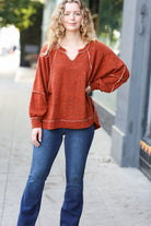 The Slouchy Rust Two Tone Knit Notched Raglan Top Haptics