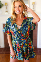 Navy Tropical Floral Surplice Romper Haptics