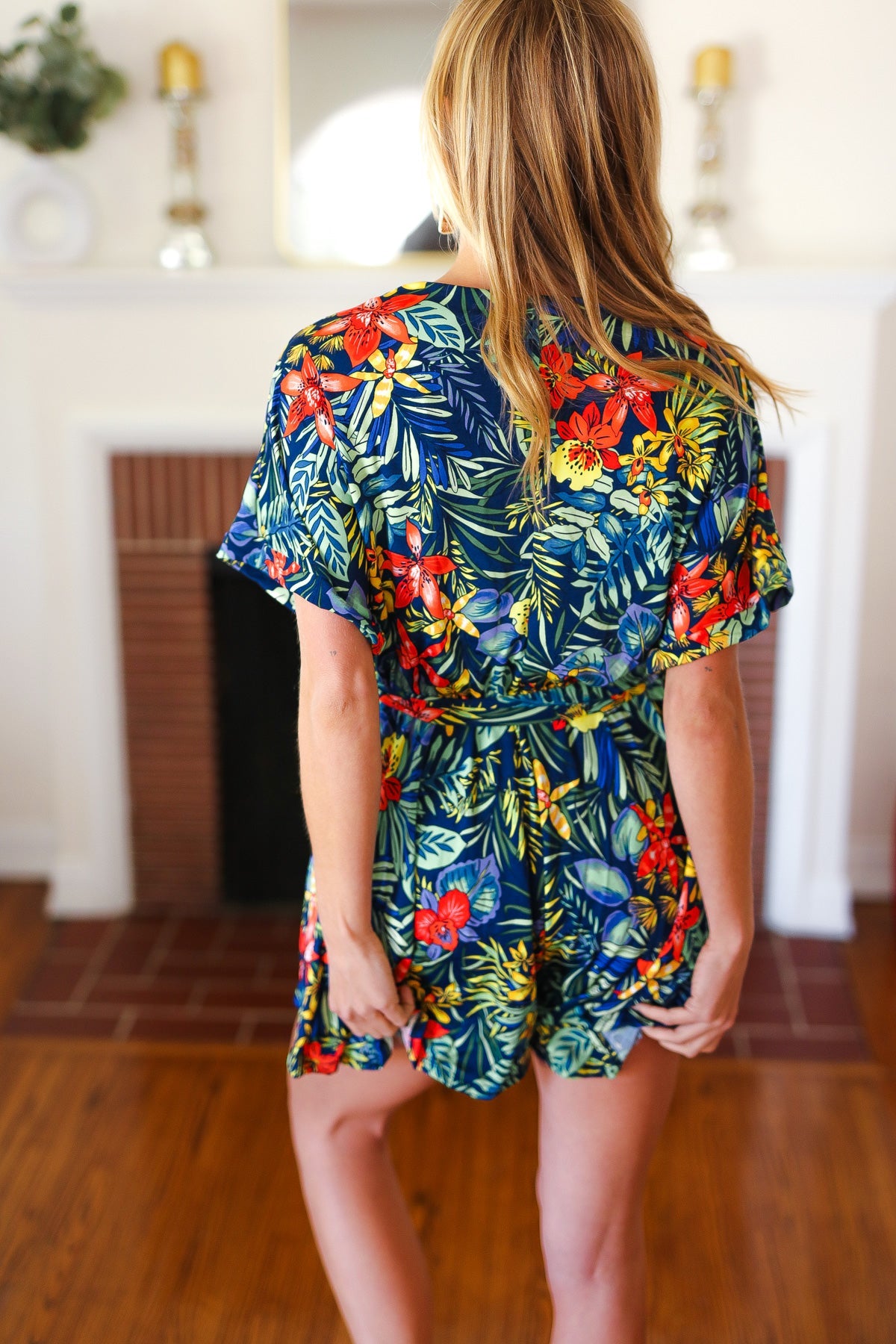 Navy Tropical Floral Surplice Romper Haptics