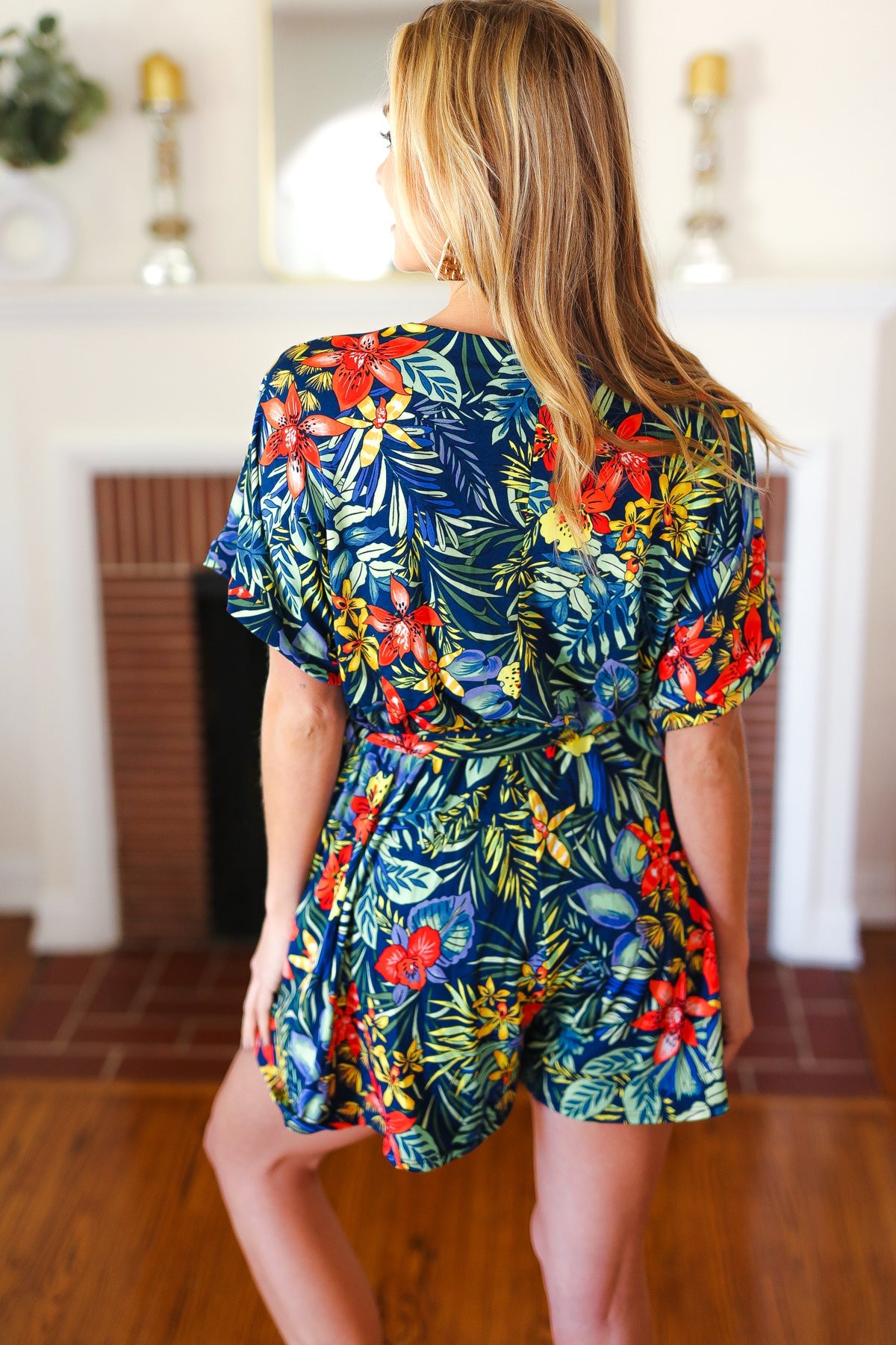 Navy Tropical Floral Surplice Romper Haptics