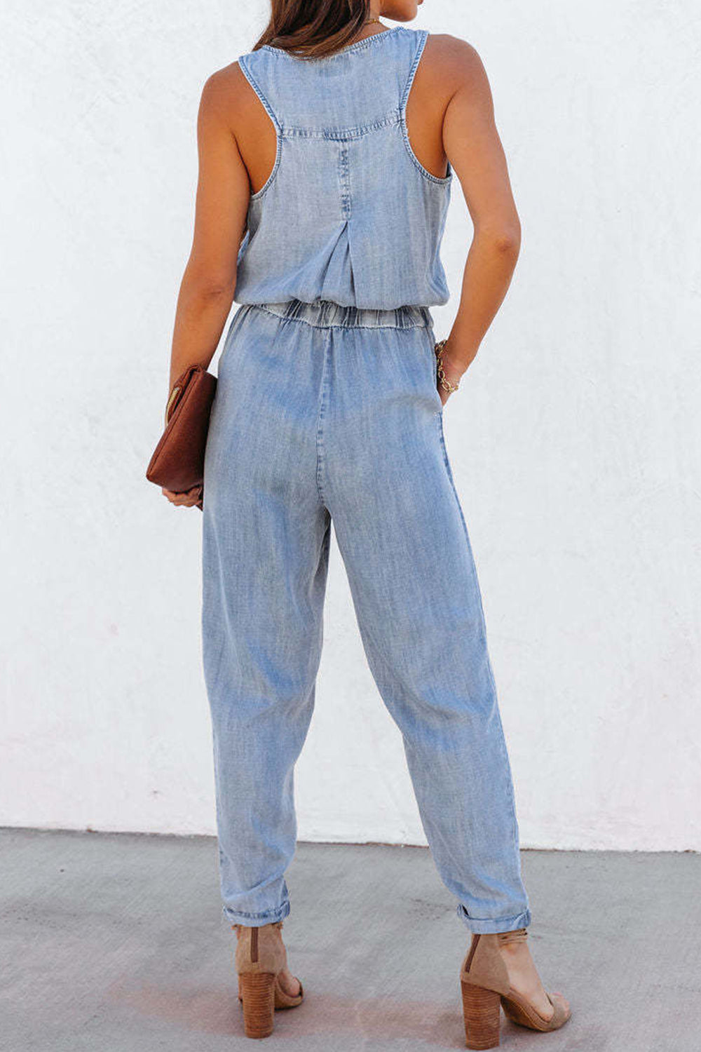 Pocketed Half Button Sleeveless Denim Jumpsuit Trendsi