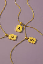 Brass diamond dust cut out initial necklace LA3accessories