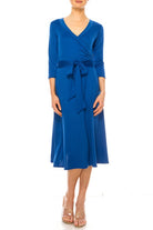 Solid faux wrap dress with deep V-neck Moa Collection