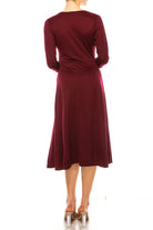 Solid faux wrap dress with deep V-neck Moa Collection