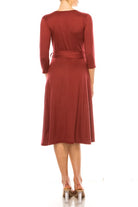 Solid faux wrap dress with deep V-neck Moa Collection