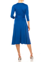 Solid faux wrap dress with deep V-neck Moa Collection