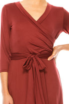 Solid faux wrap dress with deep V-neck Moa Collection