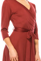 Solid faux wrap dress with deep V-neck Moa Collection