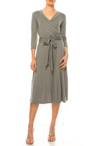 Solid faux wrap dress with deep V-neck Moa Collection