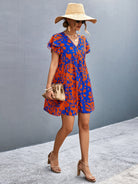 Ruffled Printed V-Neck Short Sleeve Mini Dress Trendsi