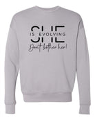 She is Evolving Bella Premium Sweatshirt Ocean and 7th