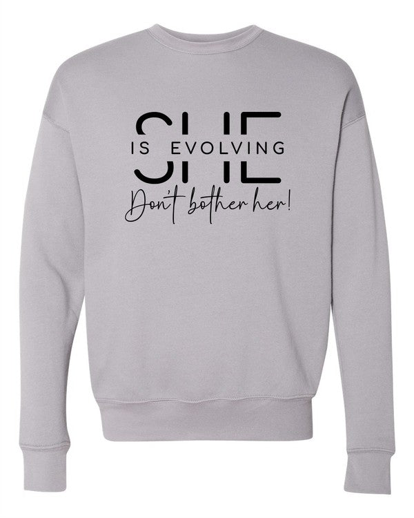 She is Evolving Bella Premium Sweatshirt Ocean and 7th