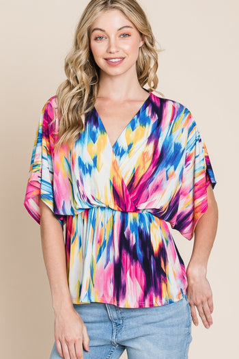 BOMBOM Printed Surplice Peplum Blouse Trendsi