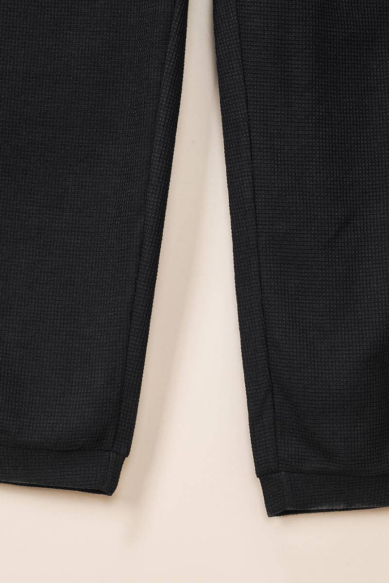 Textured Black Sleeveless V-Neck Pocketed Jumpsuit Kiwidrop