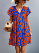 Ruffled Printed V-Neck Short Sleeve Mini Dress Trendsi