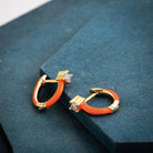 Flirt Huggie Earrings |  Orange |  Casual Chic Boutique