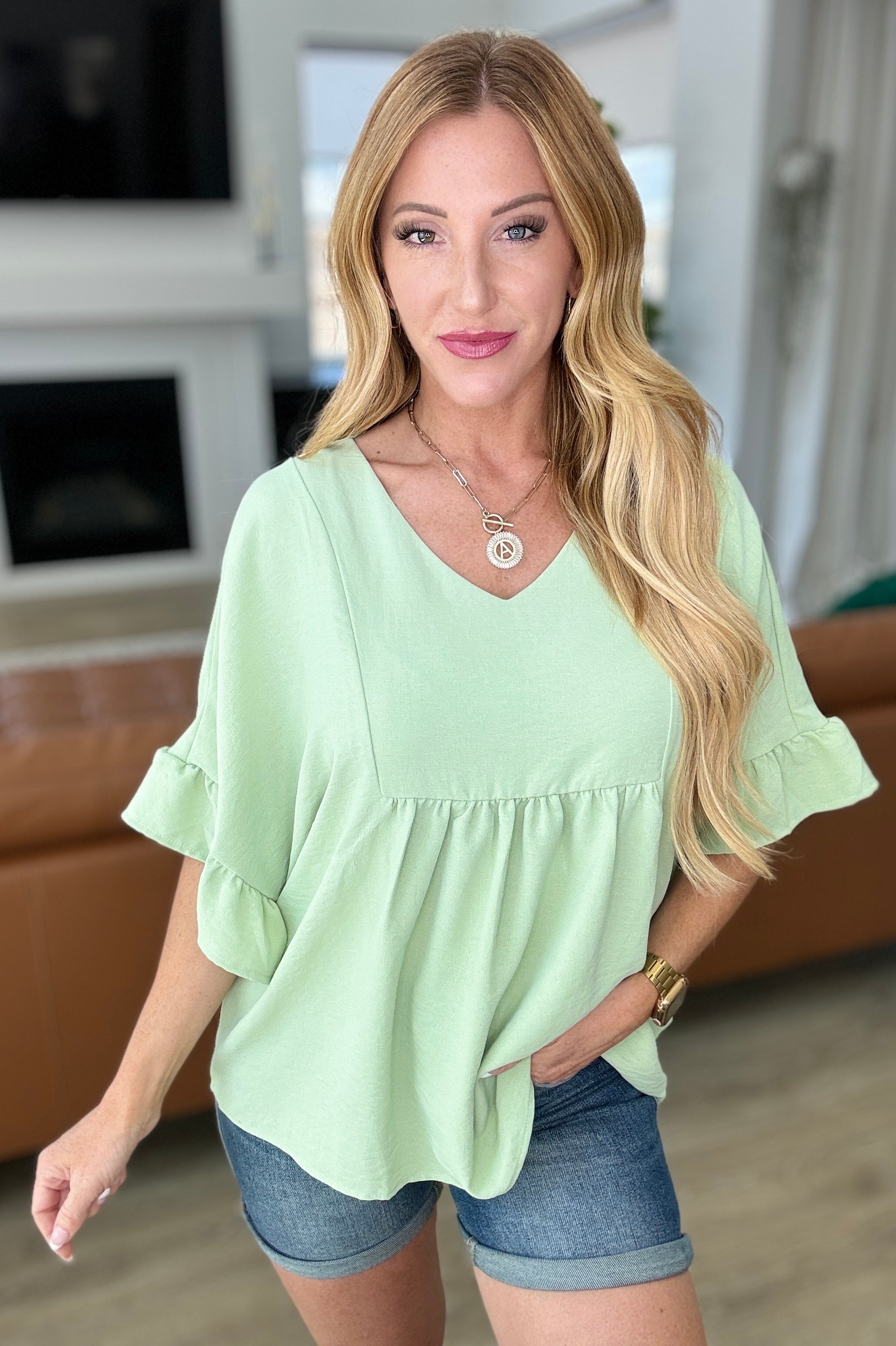 Airflow Peplum Ruffle Sleeve Top in Sage Ave Shops