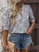 Printed Notched Half Sleeve Blouse Trendsi