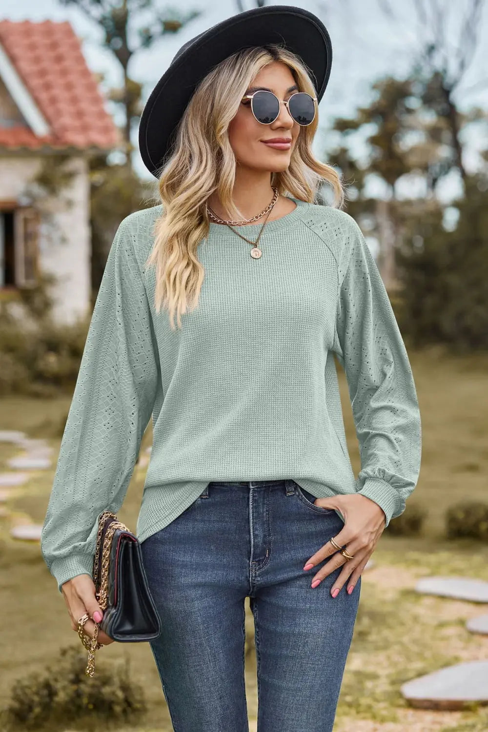 Round Neck Raglan Sleeve Sweatshirt Trendsi