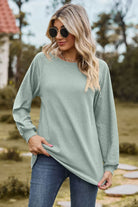 Round Neck Raglan Sleeve Sweatshirt Trendsi