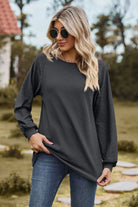 Round Neck Raglan Sleeve Sweatshirt Trendsi