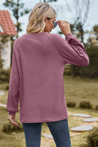 Round Neck Raglan Sleeve Sweatshirt Trendsi