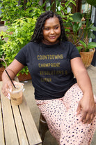 Simply Love Full Size COUNTDOWNS CHAMPAGNE RESOLUTIONS & CHEER Round Neck T-Shirt Trendsi