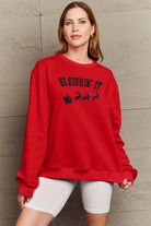 Simply Love Full Size SLEIGHIN' IT Graphic Sweatshirt Trendsi