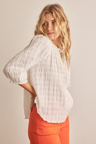 In February Textured Tie Neck Blouse Trendsi