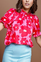 Ruffled Printed Mock Neck Short Sleeve Blouse Trendsi