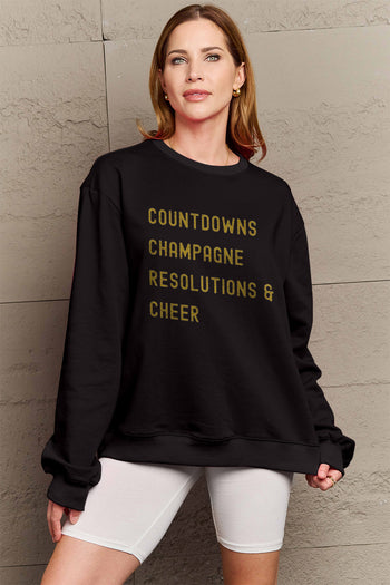 Simply Love Full Size COUNTDOWNS CHAMPAGNE RESOLUTIONS & CHEER Round Neck Sweatshirt Trendsi