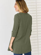 Pocketed Round Neck Half Sleeve Blouse Trendsi