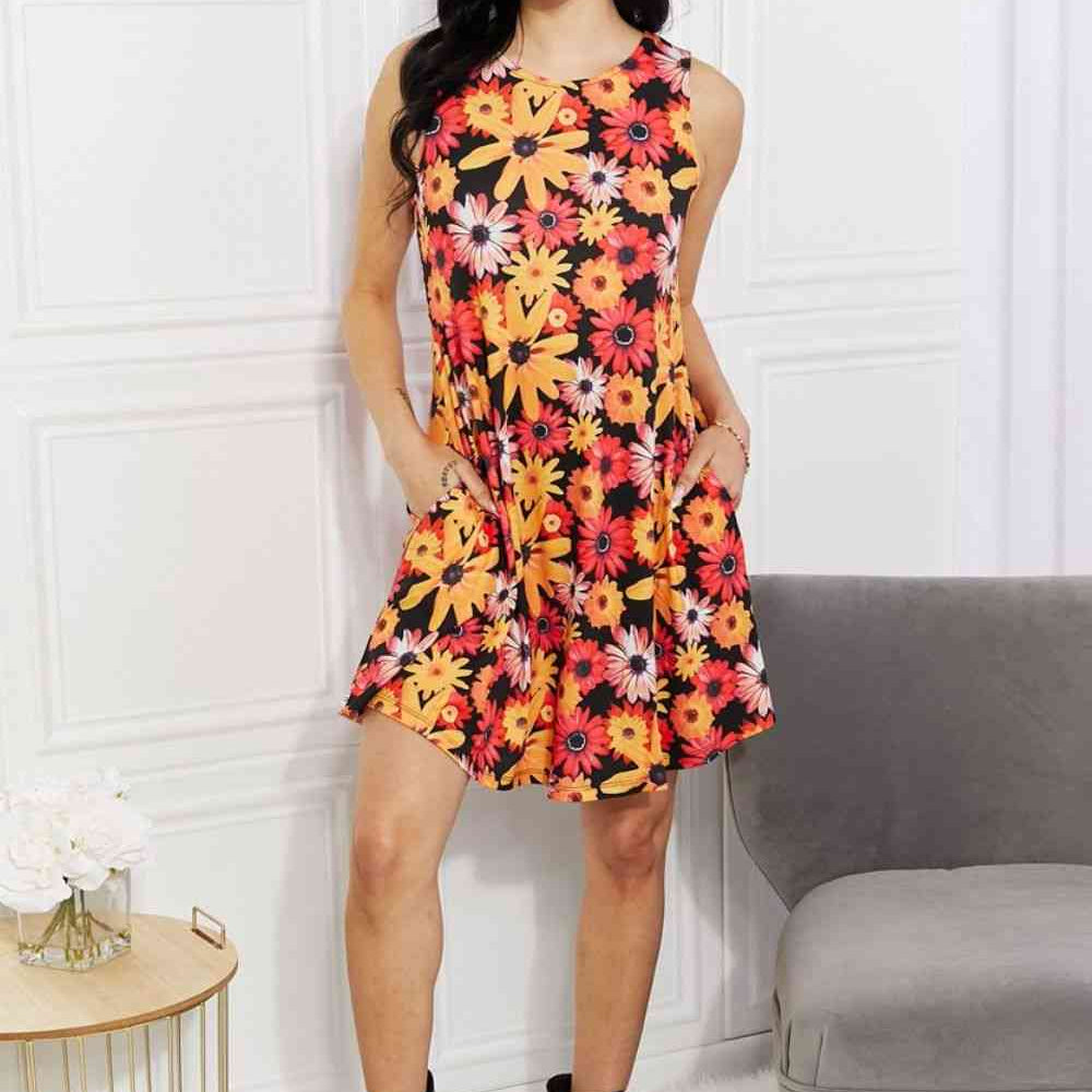 Yelete Full Size Floral Sleeveless Dress with Pockets Trendsi