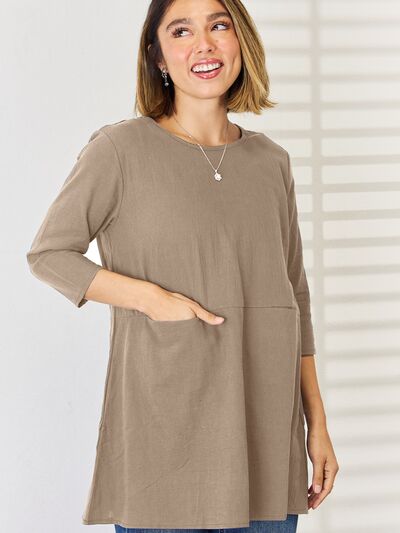 Pocketed Round Neck Half Sleeve Blouse Trendsi