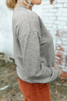 Round Neck Dropped Shoulder Sweatshirt Trendsi