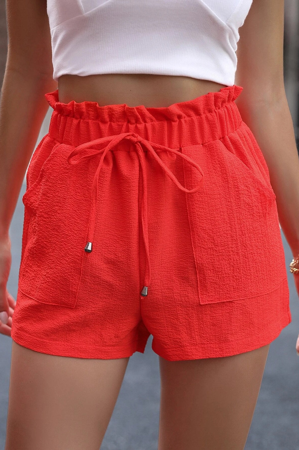 Tied High Waist Shorts with Pockets Trendsi